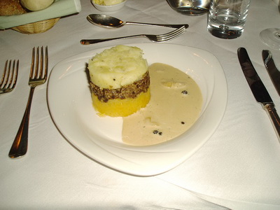 Haggis laced with Malt Whisky toped with cream served with oatkakes